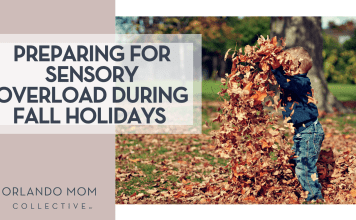 Scott Webb via Unsplash boy child with navy long shirt and jeans on throwing fall leaves in the air with 'preparing for sensory overload during fall holidays' on the left