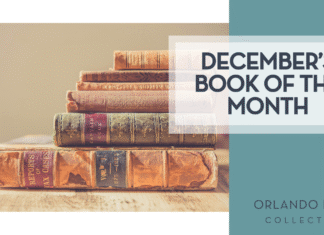 Orlando Mom Book Club: Book of the Month for December 2025 Chris Lawton via Unsplash old books stacked on wood table with tan background and 'December's book of the month' on the right hand side.