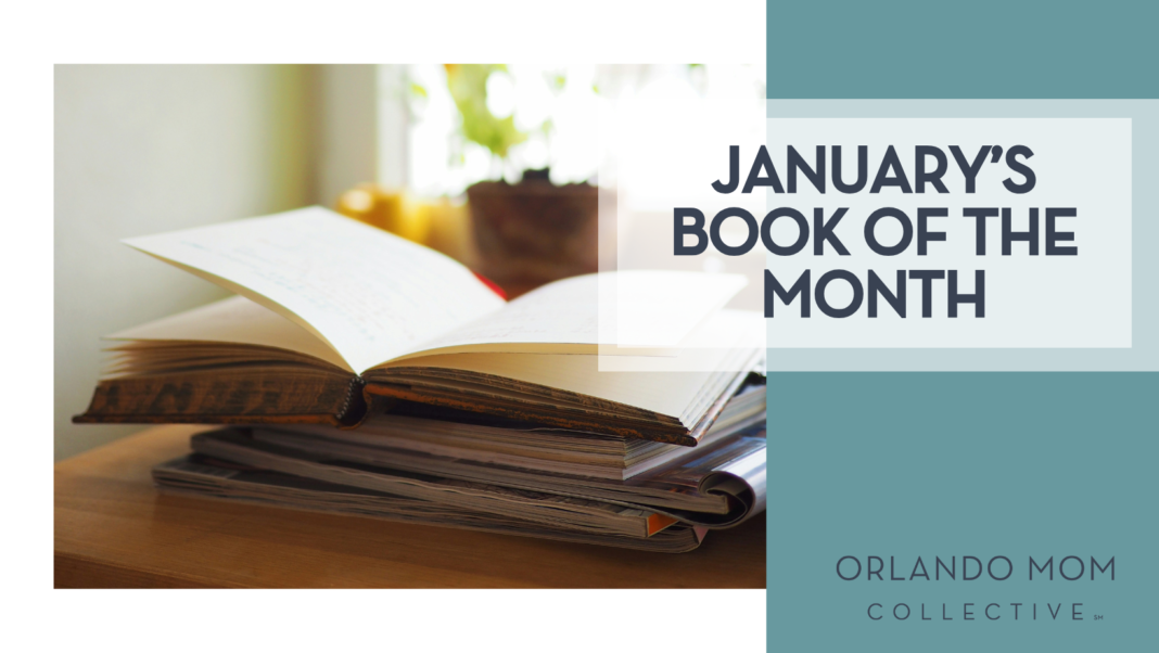 January's book of the month Fang Wei Lin via unsplash book open on a pile of books with a window and plant behind it with 'January's book of the month on the right'