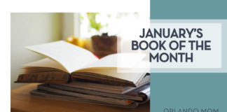 Fang Wei Lin via unsplash book open on a pile of books with a window and plant behind it with 'January's book of the month on the right'